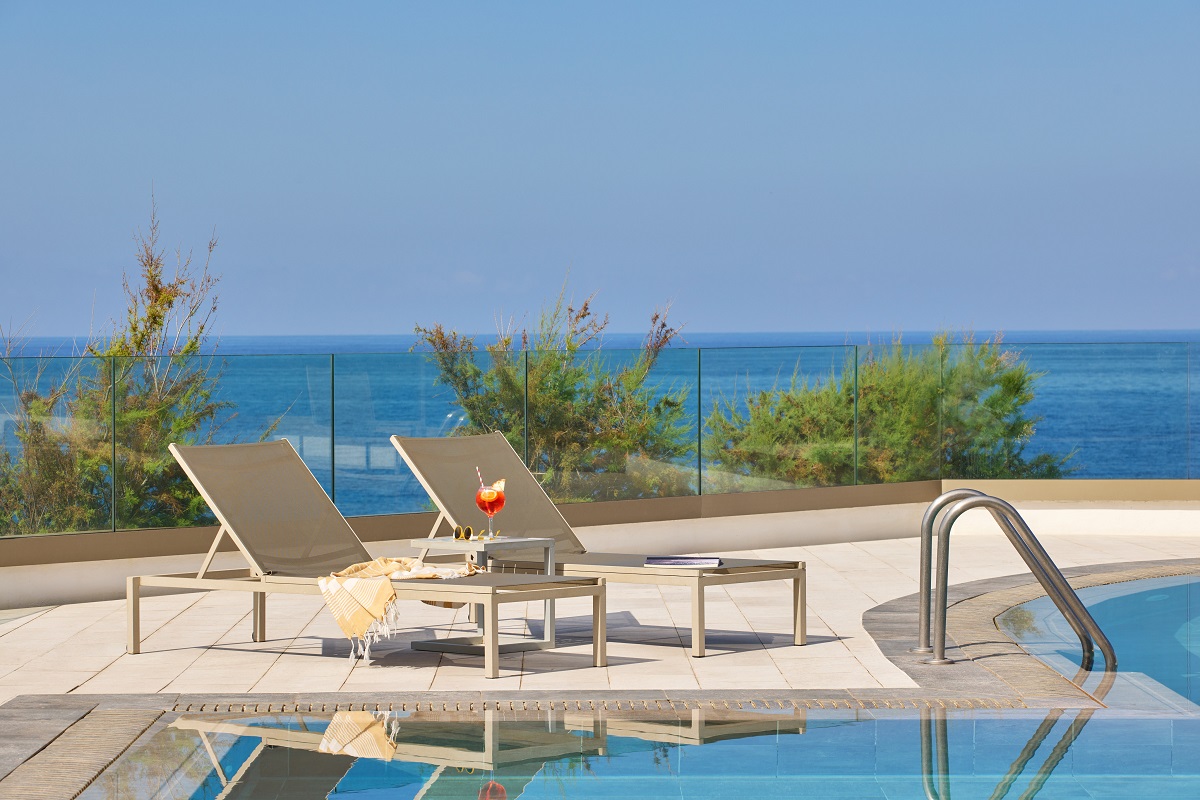 sunloungers at the pool with seaview Melia La Palma