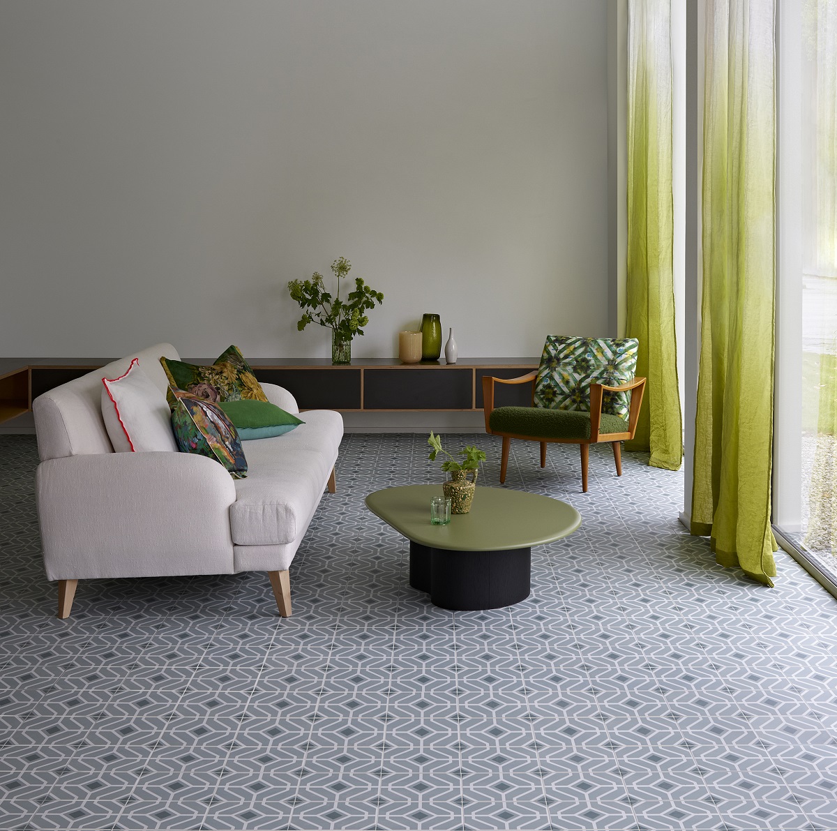 white couch on tiled floor with DESIGNERS GUILD LATERZA SLATE BLUE