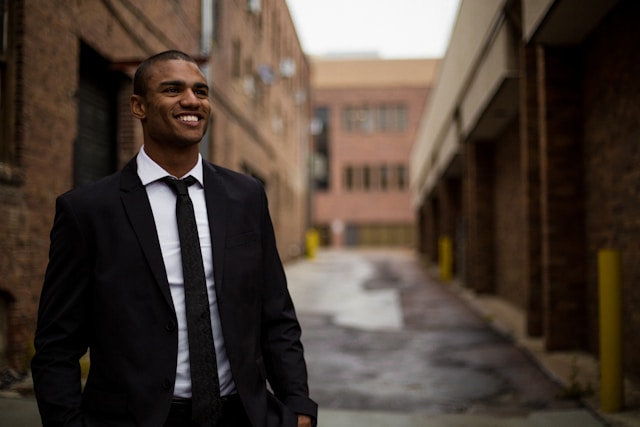 man in a business suit looking refreshed after a stay at a napping hotel