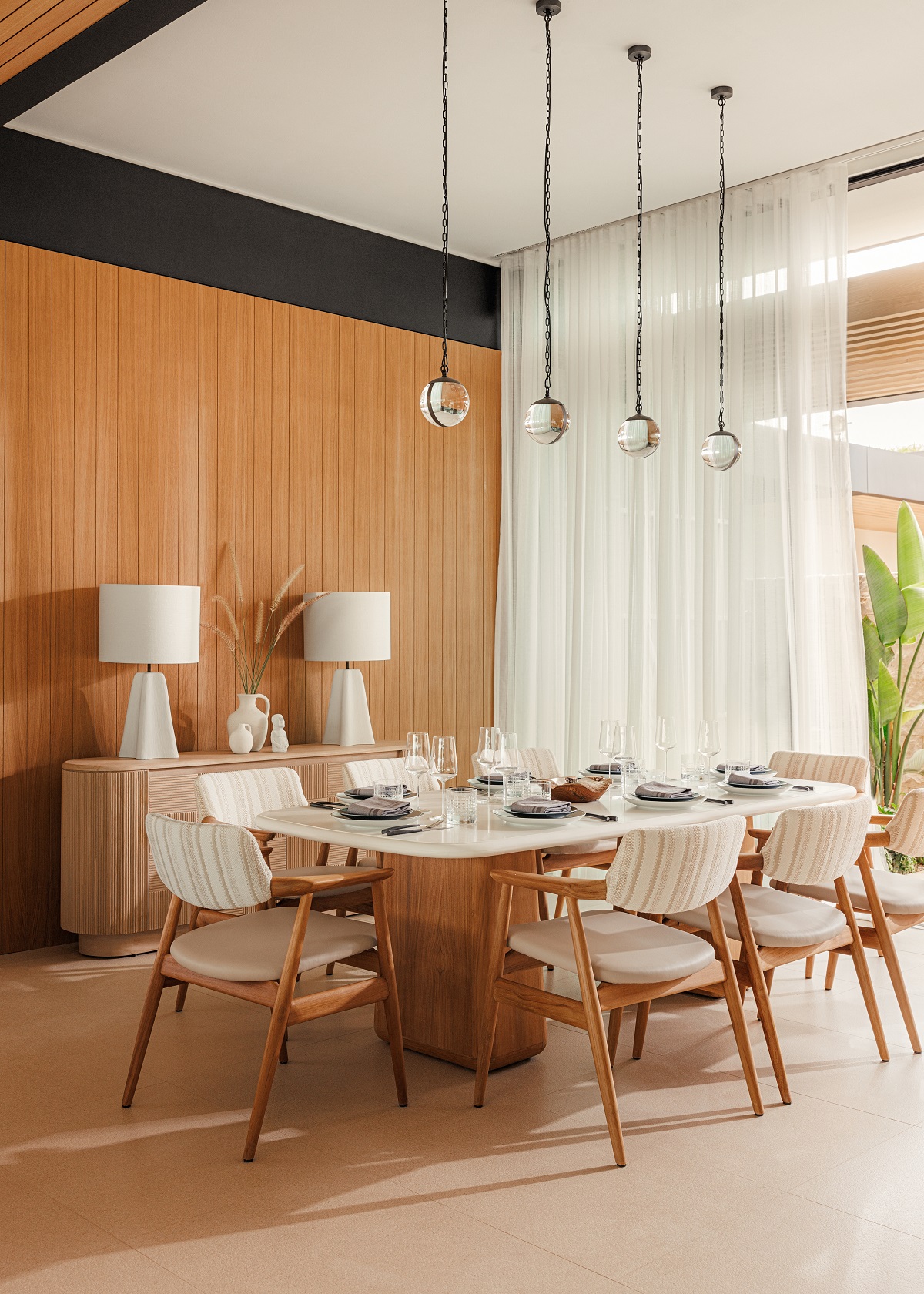 dining room table in front of doors leading onto private terrace