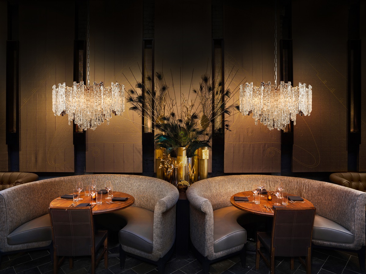 Icicle chandeliers suspended above restaurant tables