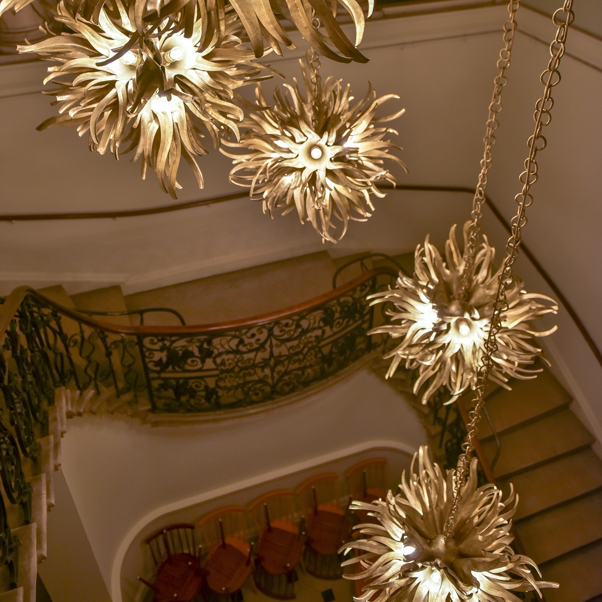 Urchin light from Porta Romana hung as a collection above stairwell